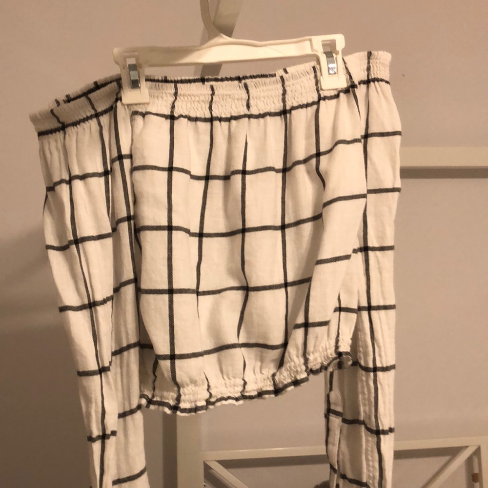 Off the shoulder, cinch at cuff and waist